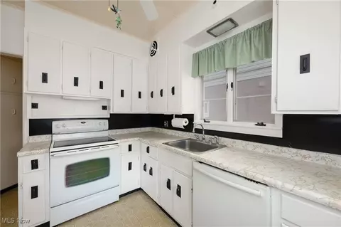 Kitchen - 319 Spring St, Dennison, OH 44621 photo 2 of 2