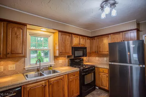 Kitchen - 54 Central Ave, Orwell, OH 44076 photo 2 of 3