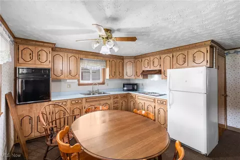 Kitchen - 142 Watson St, Dillonvale, OH 43917 photo 3 of 4