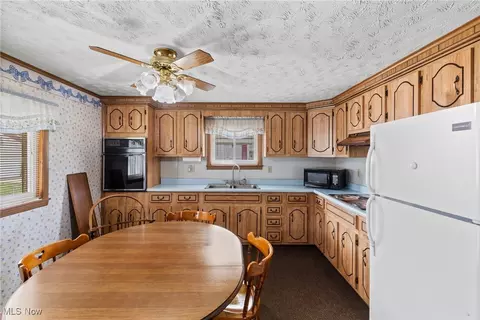 Kitchen - 142 Watson St, Dillonvale, OH 43917 photo 2 of 4