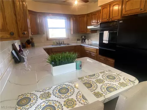 Kitchen - 341 Stephens Rd, Akron, OH 44312 photo 2 of 3