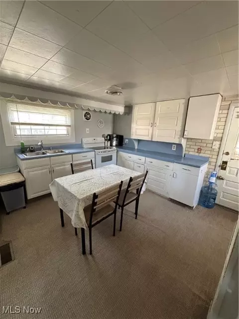Kitchen - 210 Spring St, Dennison, OH 44621 photo 1 of 2