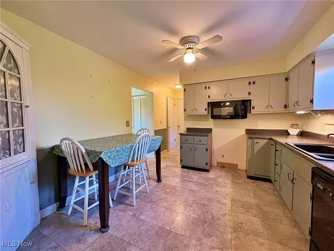 Kitchen - 417 Windsor Dr, Elyria, OH 44035 photo 2 of 3