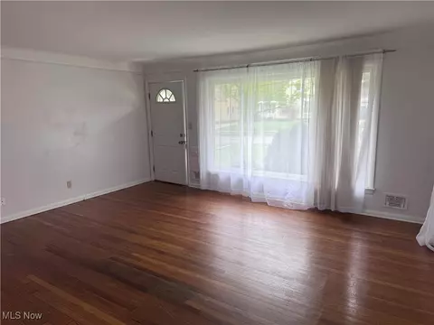 Living - 1422 Lorimer Rd, Parma, OH 44134 photo 1 of 2