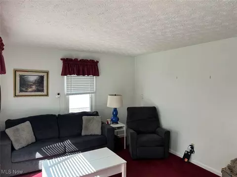 Living - 1157 Hilltop Dr, Akron, OH 44310 photo 2 of 3