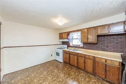 Kitchen - 1930 E 30th St, Lorain, OH 44055 photo 3 of 4