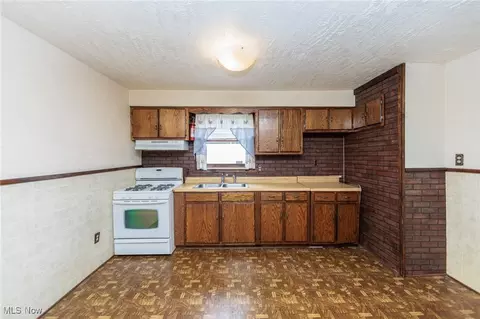 Kitchen - 1930 E 30th St, Lorain, OH 44055 photo 2 of 4
