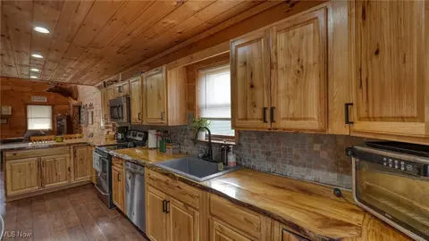 Kitchen - 8498 Euga Rd, Newcomerstown, OH 43832 photo 2 of 2