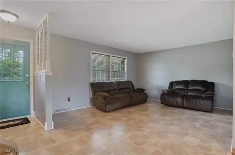 Living - 3262 Wright Rd NW, Uniontown, OH 44685 photo 2 of 5