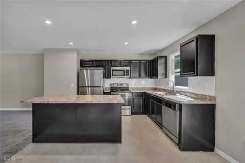 Kitchen - 301 Karson Dr, Akron, OH 44312 photo 2 of 2