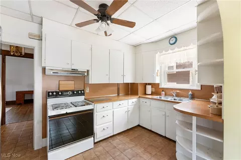 Kitchen - 327 Bellflower Ave NW, Canton, OH 44708 photo 2 of 2