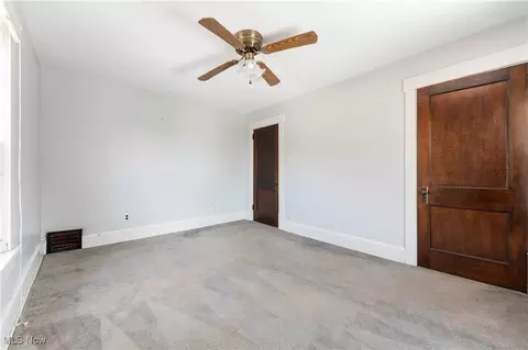 Bedroom - 327 Bellflower Ave NW, Canton, OH 44708 photo 2 of 9