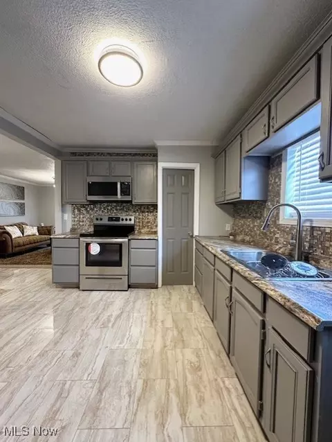 Kitchen - 216 E 33rd St, Lorain, OH 44055 photo 1 of 2