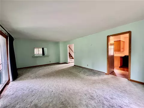 Living - 443 Beech Row Dr, Norton, OH 44203 photo 1 of 3