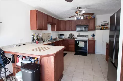 Kitchen - 1614 E 49th St, Ashtabula, OH 44004 photo 2 of 4