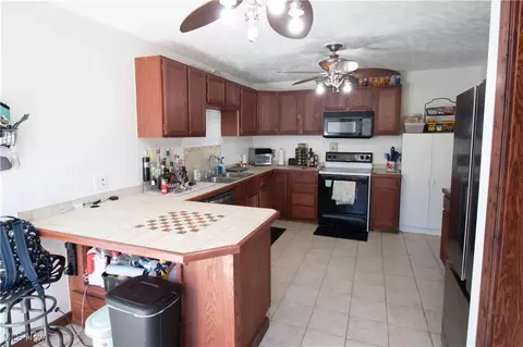 Kitchen - 1614 E 49th St, Ashtabula, OH 44004 photo 3 of 4