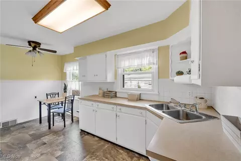 Kitchen - 390 Hilliard Rd, Elyria, OH 44035 photo 3 of 3