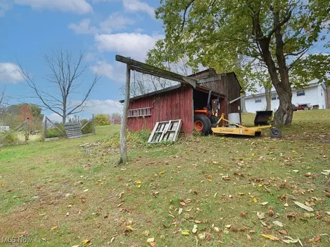 Exterior - 2430 River Rd, Willoughby Hills, OH 44094 photo 10 of 14