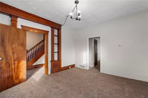 Living - 301 E Voris St, Akron, OH 44311 photo 2 of 3