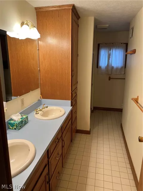 Bath - 213 E 27th St, Dover, OH 44622 photo 3 of 4