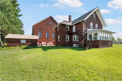 Exterior - 2409 Gilbert Ave NE, Canton, OH 44705 photo 4 of 5