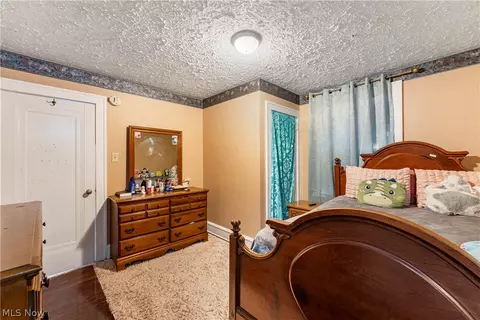 Bedroom - 2409 Gilbert Ave NE, Canton, OH 44705 photo 2 of 11