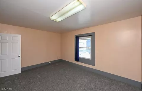 Bedroom - 868 N Main St, Akron, OH 44310 photo 3 of 12