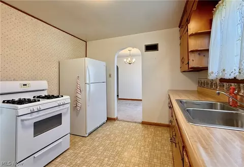 Kitchen - 175 3rd St, Lowell, OH 45744 photo 2 of 3