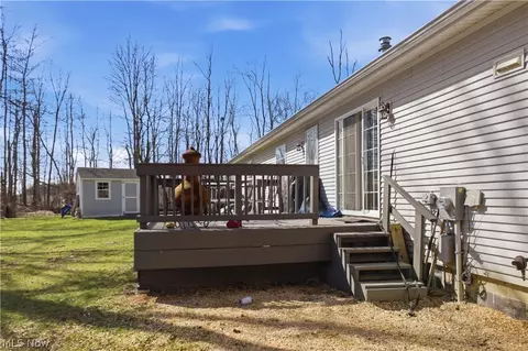 Exterior - 898 Longshadow Dr, Roaming Shores, OH 44084 photo 7 of 8