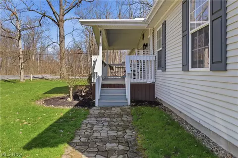 Exterior - 898 Longshadow Dr, Roaming Shores, OH 44084 photo 3 of 8