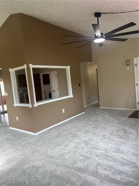 Living - 6804 Dave Dr, Madison, OH 44057 photo 2 of 3