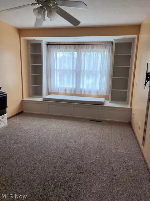 Living - 105 Poolview Cir, Dover, OH 44622 photo 4 of 4