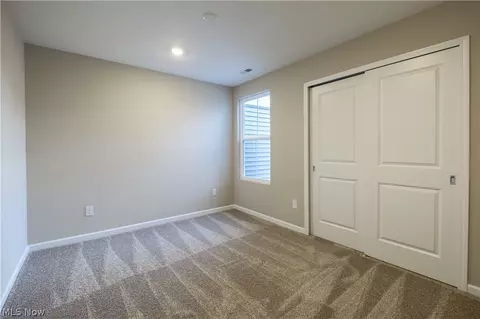 Bedroom - 945 Memory Ln # -4, Aurora, OH 44202 photo 2 of 4
