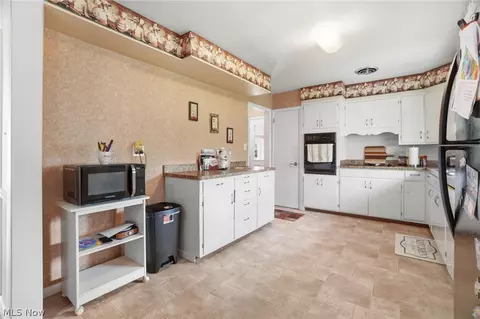 Kitchen - 1416 W 64th St, Ashtabula, OH 44004 photo 2 of 3