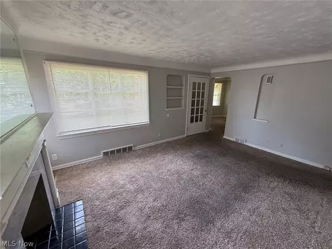 Living - 411 E 264th St, Euclid, OH 44132 photo 3 of 4