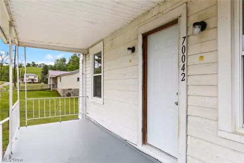 Exterior - 70042 1st St, Flushing, OH 43977 photo 4 of 5