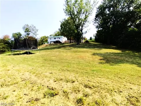 Exterior - 61900 Fairview Rd, Barnesville, OH 43713 photo 1 of 12