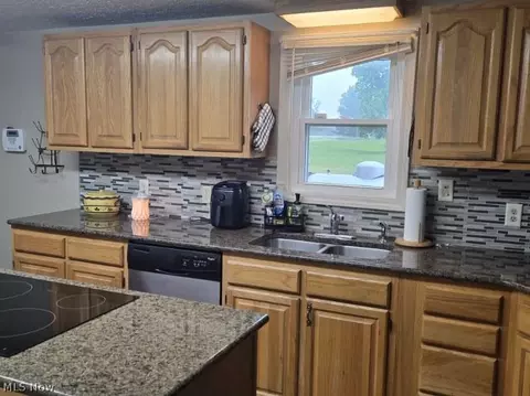Kitchen - 387 Stable Dr, Lagrange, OH 44050 photo 2 of 3