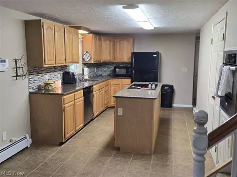 Kitchen - 387 Stable Dr, Lagrange, OH 44050 photo 3 of 3