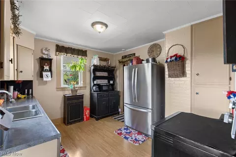 Kitchen - 383 High St, Flushing, OH 43977 photo 2 of 2