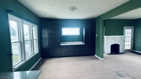 Living - 407 Korman Ave NE, Massillon, OH 44646 photo 2 of 3
