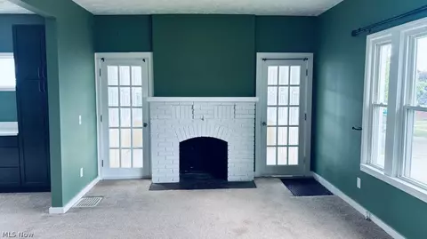 Living - 407 Korman Ave NE, Massillon, OH 44646 photo 1 of 3