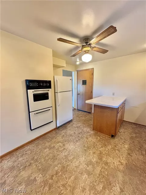 Kitchen - 1407 W Valentine Cir NW, Canton, OH 44708 photo 4 of 4