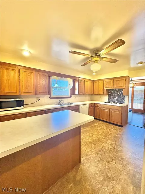 Kitchen - 1407 W Valentine Cir NW, Canton, OH 44708 photo 2 of 4