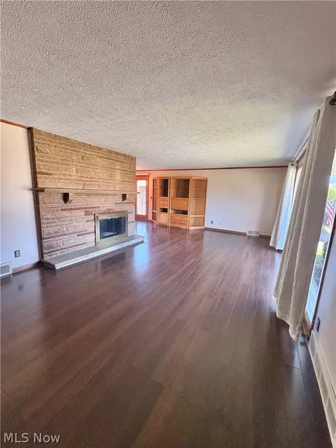 Living - 1407 W Valentine Cir NW, Canton, OH 44708 photo 1 of 2