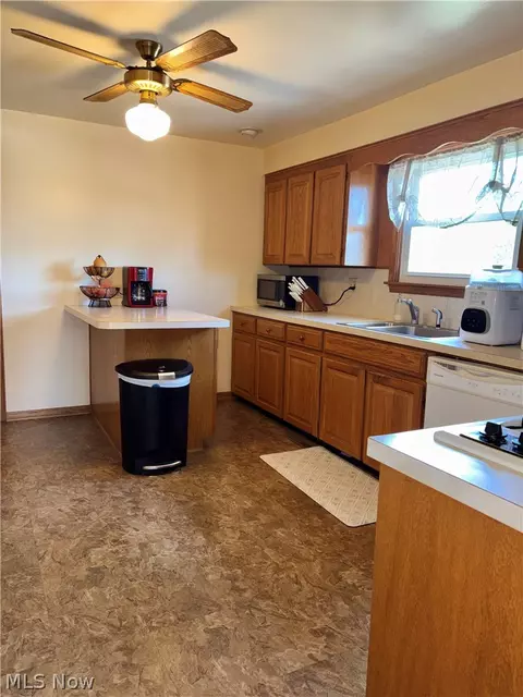 Kitchen - 1407 W Valentine Cir NW, Canton, OH 44708 photo 1 of 2