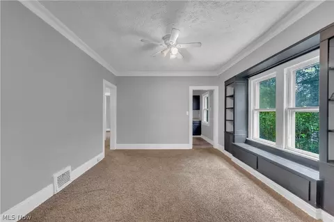 Living - 14009 Scioto Ave, East Cleveland, OH 44112 photo 4 of 11