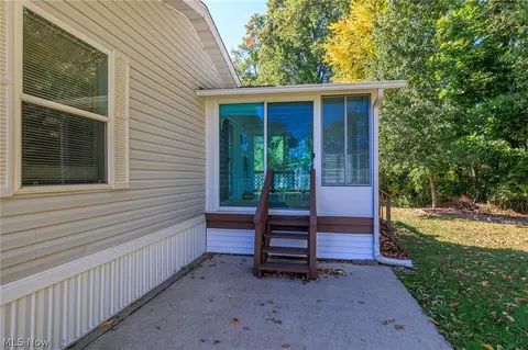 Exterior - 77 Periwinkle Dr, Olmsted Twp, OH 44138 photo 6 of 11