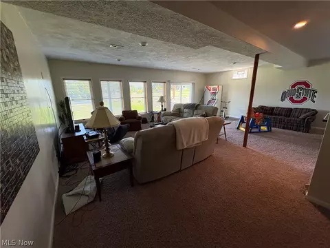 Living - 1047 Lode Star Dr, Roaming Shores, OH 44085 photo 2 of 3