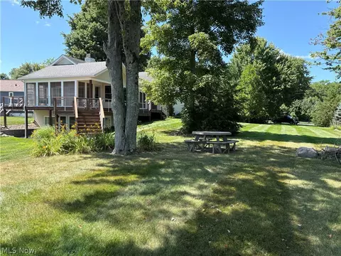 Exterior - 1047 Lode Star Dr, Roaming Shores, OH 44085 photo 4 of 7